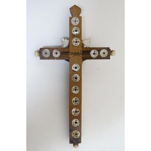 811 - A 'Jerusalem' mother of pearl and olive wood crucifix with 14 numbered mother of pearl roundel verso... 