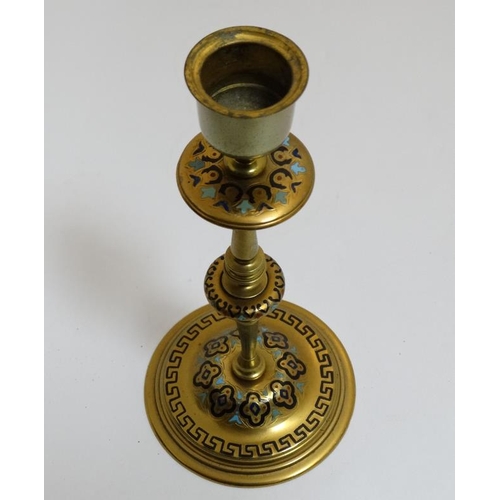 816 - A pair of 19thC Arts and Crafts brass and enamel turned candlesticks. 7 1/2'' high