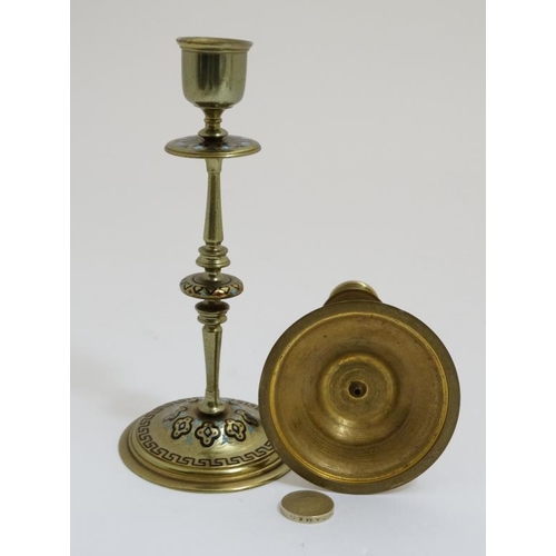 816 - A pair of 19thC Arts and Crafts brass and enamel turned candlesticks. 7 1/2'' high