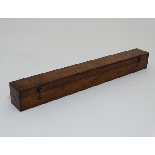 828 - A mahogany box opening to reveal 6 boxwood rulers by ' Davis & Son Derby ' , ' Bemrose & Sons Derby ... 