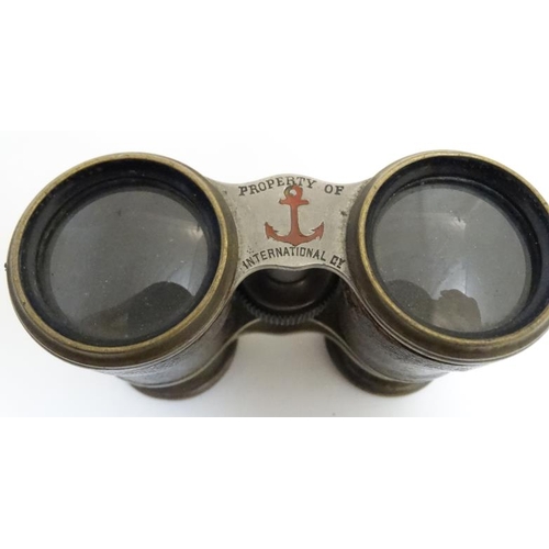 829 - Binoculars : A collection of four pairs of Opera and Racing Glasses by the Jockey Club etc , the lar... 