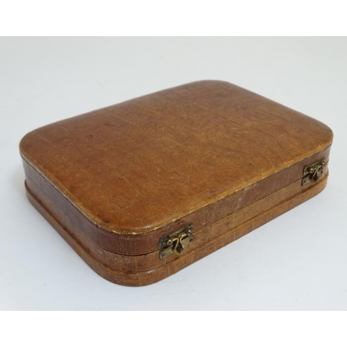 832 - An early 20thC crocodile skin hinged lidded box together with a leather purse the largest 8'' wide  ... 