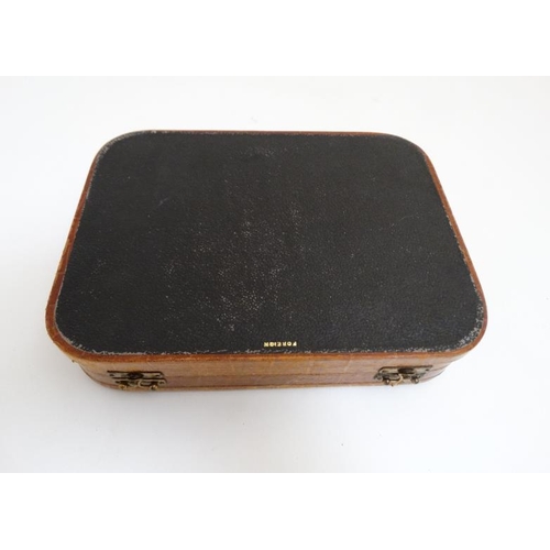 832 - An early 20thC crocodile skin hinged lidded box together with a leather purse the largest 8'' wide  ... 