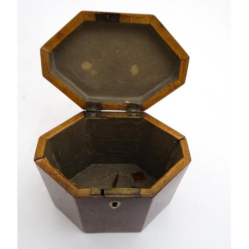 836 - A Georgian burr yew neoclassical tea caddy of lozenge shape. 4 3/4'' high x 5 1/2'' wide