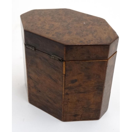 836 - A Georgian burr yew neoclassical tea caddy of lozenge shape. 4 3/4'' high x 5 1/2'' wide