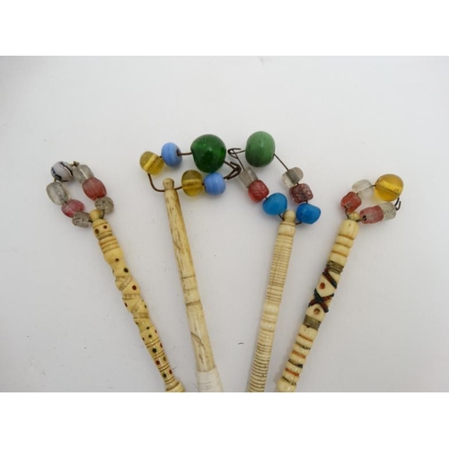 839 - Lace Making : 4 bone lace makers bobbins with spangles. Approx 4 1/2'' long