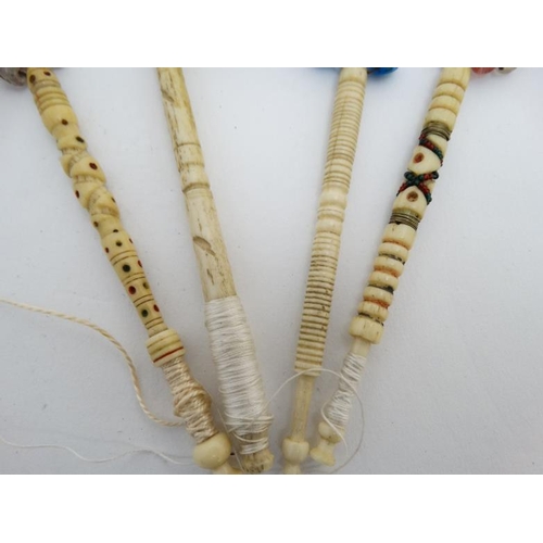 839 - Lace Making : 4 bone lace makers bobbins with spangles. Approx 4 1/2'' long