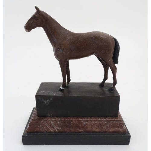 847 - After Andre, A late 20thC cold painted bronze trophy depicting a chestnut horse with white blaze and... 