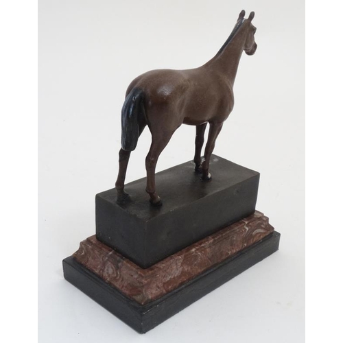 847 - After Andre, A late 20thC cold painted bronze trophy depicting a chestnut horse with white blaze and... 