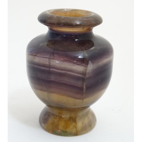 849 - A hard stone turned vase, possibly Blue John. 5 1/4'' high