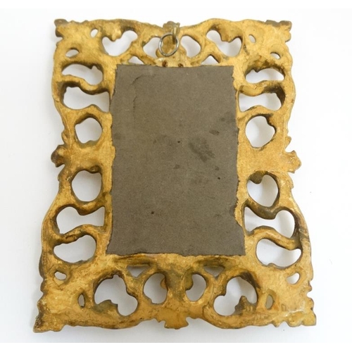 851 - A Victorian gilded and carved wooden Florentine frame, the whole 5 1/2'' x 4 1/4''