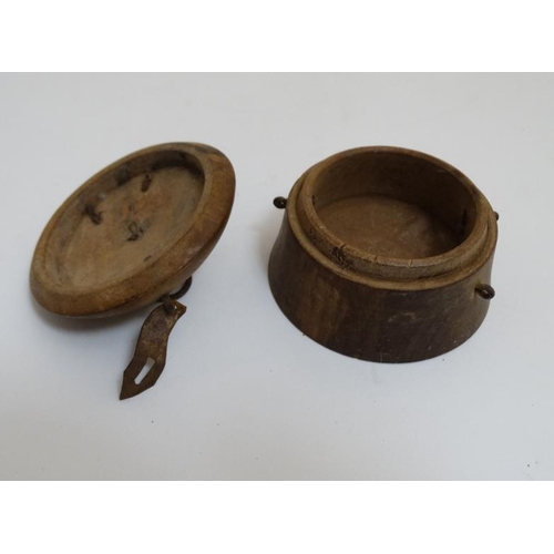 852 - An old Indian clay? spice box with inked bone? decoration of domed circular lidded form 3'' wide x 2... 