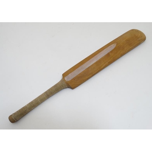 853 - A novelty small cricket bat probably by Grey Nicholls? 11 1/2'' long