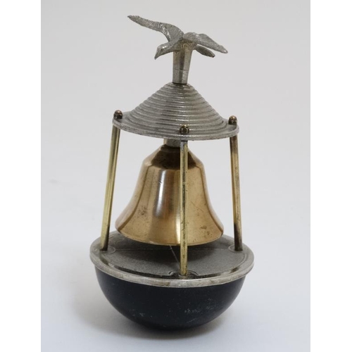 856 - A 20thC novelty desk bell in the form of a seabird above a buoy bears reg design number under 5 1/2'... 