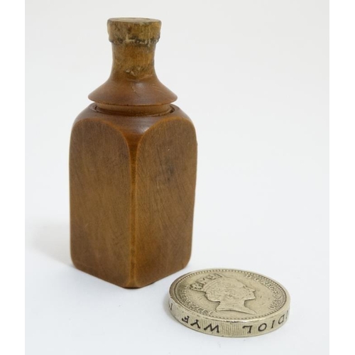 862 - Cointreau Tripple Sec - A novelty carved miniature boxwood bottle shaped container unscrewing to rev... 