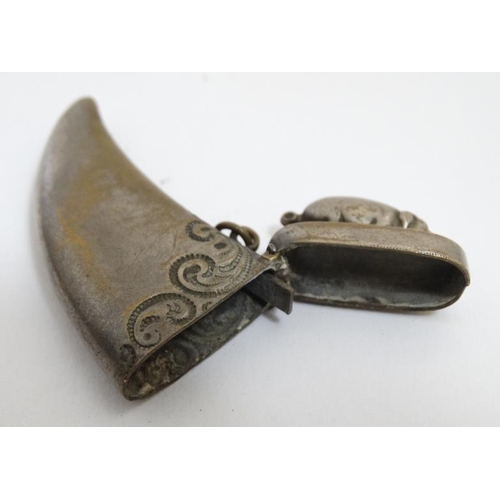 865 - An Anglo Indian nickel plated brass vesta / match holder formed as a stylised boar tooth, the hinged... 