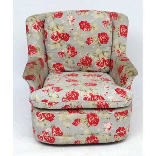 87 - A mid 20thC armchair with Cath Kidston style upholstery. 30 1/2'' high