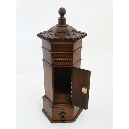 897 - A late 20thC Victorian style hexagonal shaped country house / hotel  wooden post box 22'' high