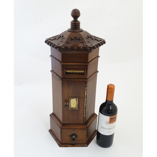 897 - A late 20thC Victorian style hexagonal shaped country house / hotel  wooden post box 22'' high