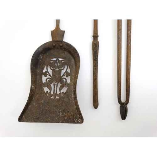 912 - 3 19thC steel fire tools with hexagonal pointed finials comprising shovel tongs and poker . 29'' lon... 