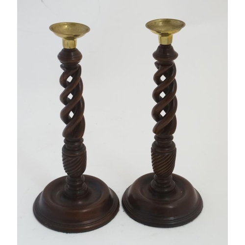 924 - A pair of 21stC three sectional open twist candlesticks 12'' high