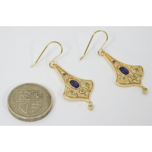 979 - A pair of silver gilt drop earrings set with amethyst, peridot and white stones. Approx 1 1/2'' long