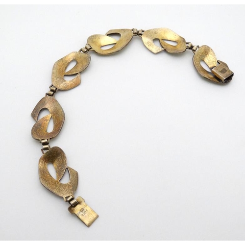 995 - Scandinavian Jewellery : A silver gilt bracelet with lime green guilloché enamel decoration. Marked ... 