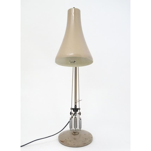 104 - Vintage Retro : an English Herbert Terry and Sons model 90 Anglepoise lamp in buff livery , labelled... 