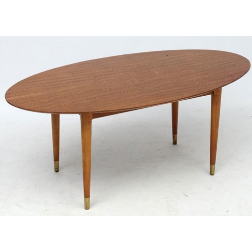 109 - Vintage Retro / Art Deco : a 1950's oval Tiger Maple Occasional / Coffee table on four turned taperi... 