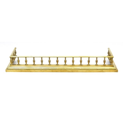 1095 - Garden and Architectural : a circa 1900 cast brass fire fender , measuring 6 1/2'' high x 14'' D x 4... 