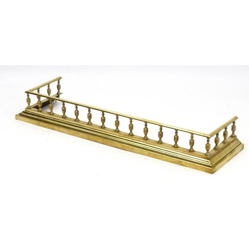 1095 - Garden and Architectural : a circa 1900 cast brass fire fender , measuring 6 1/2'' high x 14'' D x 4... 