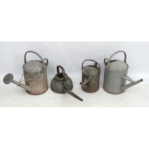 1097 - Salvage : a Garden and Architecture a collection of 4 galvanized watering cans of various sizes, one... 