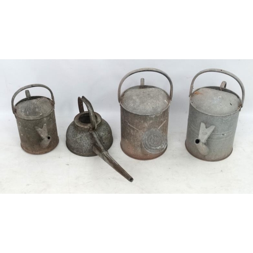 1097 - Salvage : a Garden and Architecture a collection of 4 galvanized watering cans of various sizes, one... 