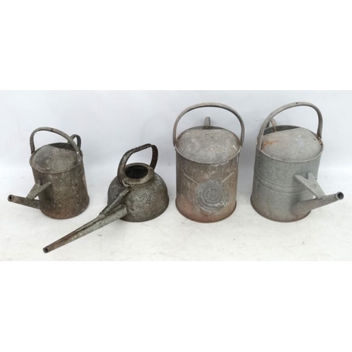 1097 - Salvage : a Garden and Architecture a collection of 4 galvanized watering cans of various sizes, one... 