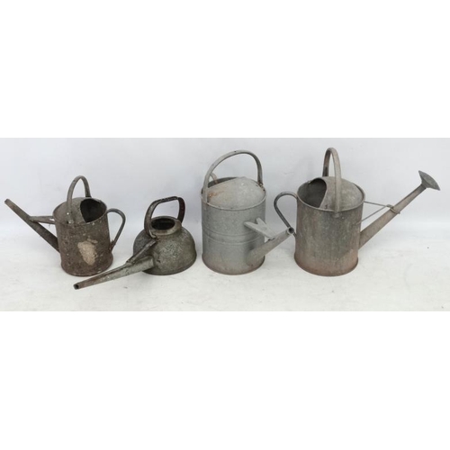 1097 - Salvage : a Garden and Architecture a collection of 4 galvanized watering cans of various sizes, one... 