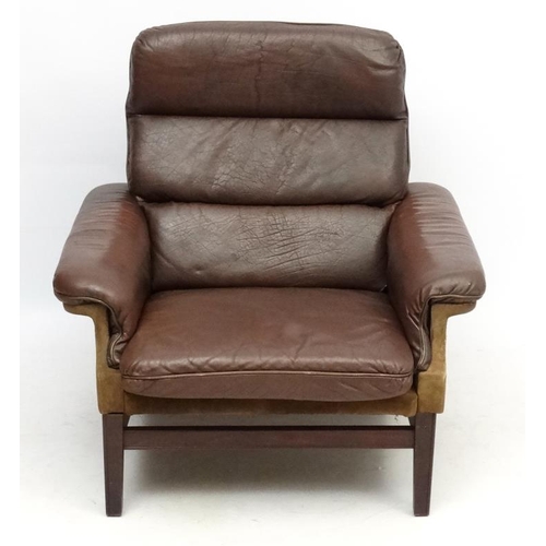 119A - Vintage Retro : a Danish brown leather ( and small amount of brown suede ) lounge armchair standing ... 