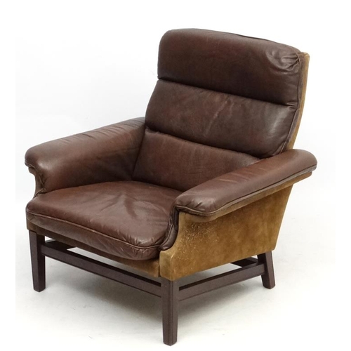 119A - Vintage Retro : a Danish brown leather ( and small amount of brown suede ) lounge armchair standing ... 