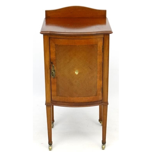 179 - An Edwardian inlaid and cross banded mahogany bow front bedside cabinet 16 3/4'' wide x 17'' deep st... 