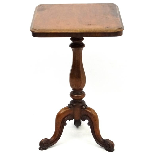 180 - A William IV mahogany tripod squared topped table with octagonal vase shaped pedestal. 21 1/2'' wide... 