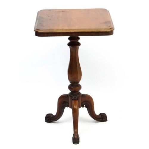 180 - A William IV mahogany tripod squared topped table with octagonal vase shaped pedestal. 21 1/2'' wide... 