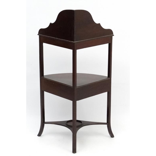 183 - A Geo III mahogany corner washstand 40 3/4'' high  Please Note -  we do not make reference to the co... 