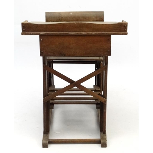 198 - An early 20thC stained oak adjustable height school desk and seat with right handed desk extension 3... 