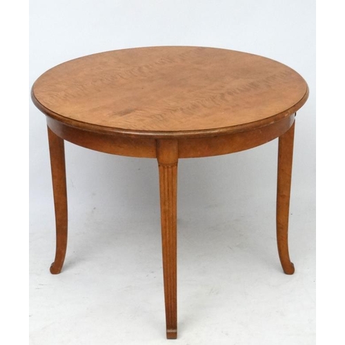 203 - Art Deco, a circular table with shaped legs  33 1/4'' diameter x 26 1/4'' high  Please Note -  we do... 