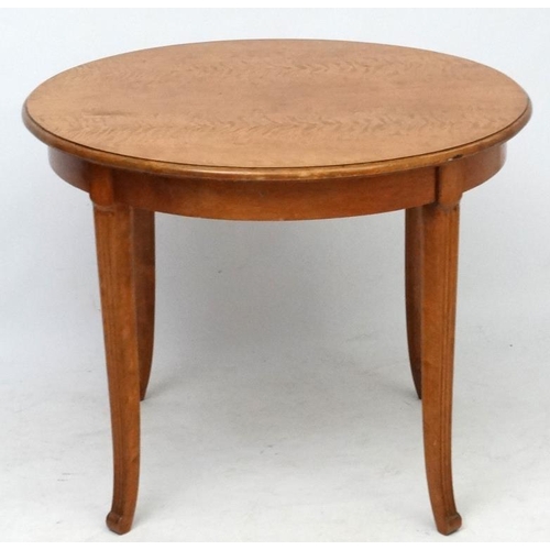 203 - Art Deco, a circular table with shaped legs  33 1/4'' diameter x 26 1/4'' high  Please Note -  we do... 