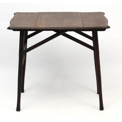 208 - A late 19thC folding  walnut coaching table of serpentine shape 29 1.2'' long x 20'' wide x 27 1/2''... 