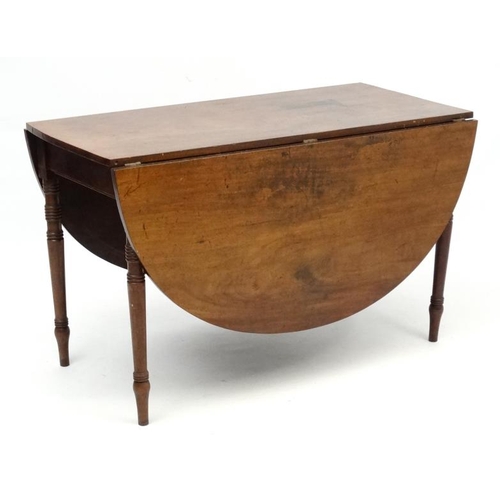 213 - An early 20thC Geo IV mahogany D-ended drop flap table with 4 legs approx 45 1/2'' wide extending to... 