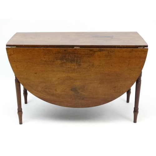 213 - An early 20thC Geo IV mahogany D-ended drop flap table with 4 legs approx 45 1/2'' wide extending to... 