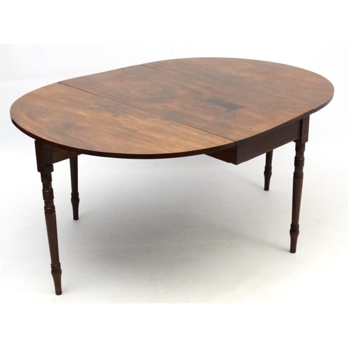 213 - An early 20thC Geo IV mahogany D-ended drop flap table with 4 legs approx 45 1/2'' wide extending to... 