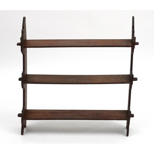 218 - A late Victorian mahogany stained beech set of freestanding / wall hanging open bookshelves.  26 1/2... 