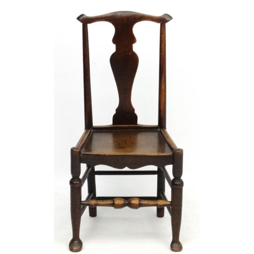 224 - An 18thC oak chair with solid seat and vase shaped splat 37 1/2'' high  Please Note -  we do not mak... 